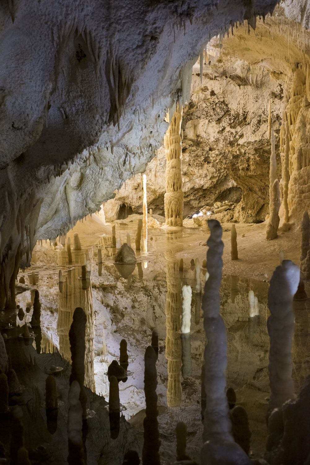 Stalagtites reflecting in the water, Frasassi Caves, Italy